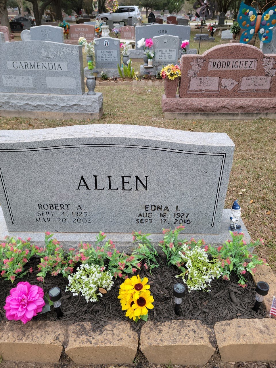 A photo of the Robert and Edna Allen gravesite before a recent cleaning at Katy Magnolia Cemetery.
